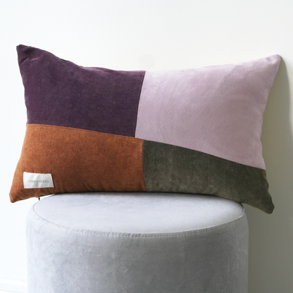 Orange, Purple, Green and Lilac panelled rentable cushion with branded LannyxStudio label.
